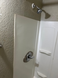 I missed the single bulb light with no shade. But the caulk was everywhere places by a 3rd grader.