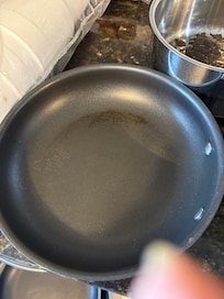 Butter or grease in frying pan