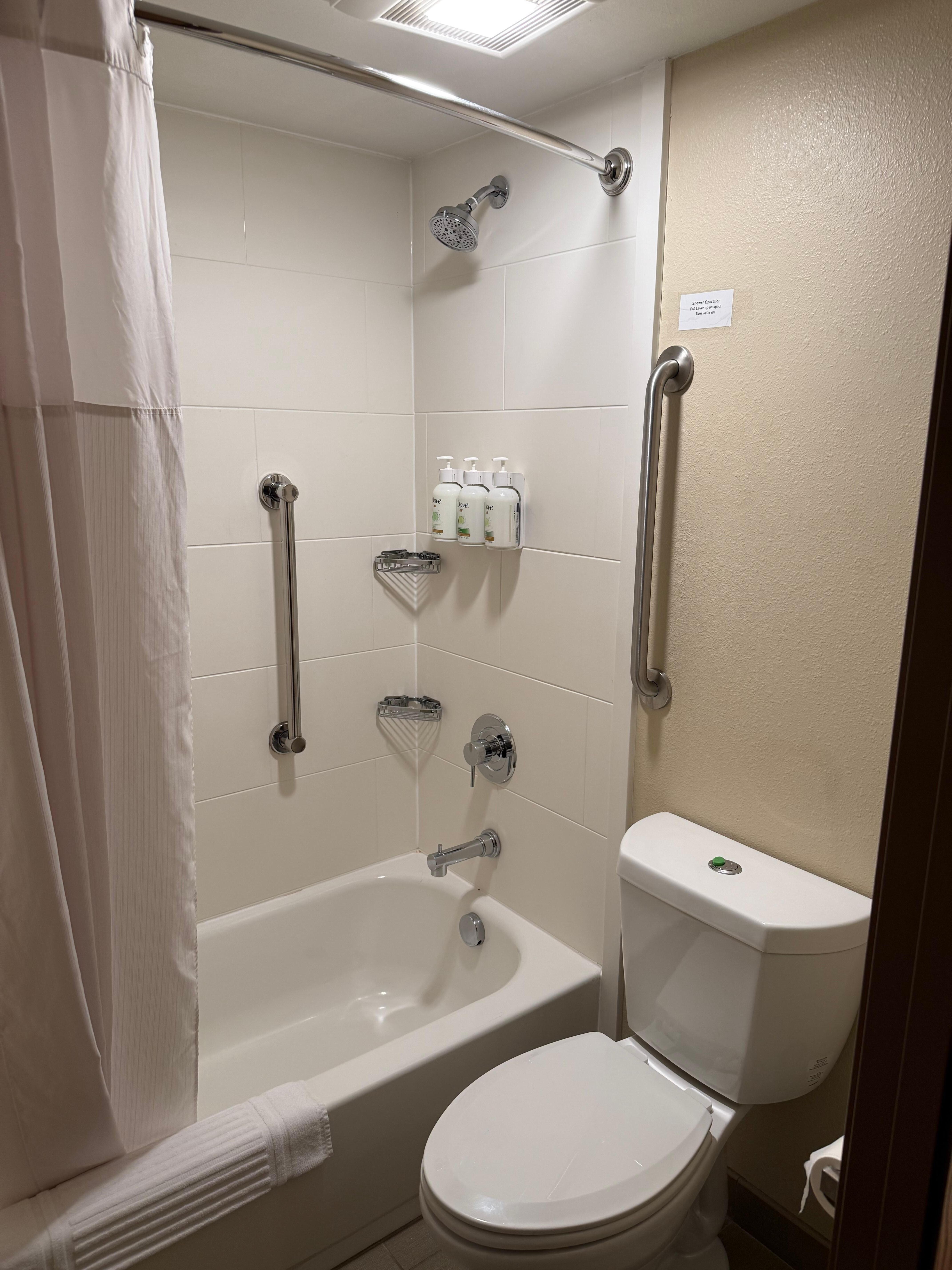  Bathroom had toilet and shower. Sink was outside the bathroom. 
