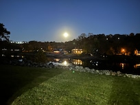 Full moon reflecting off the water.