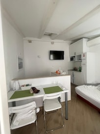 Upper floor of apt. 3 which has a balcony.