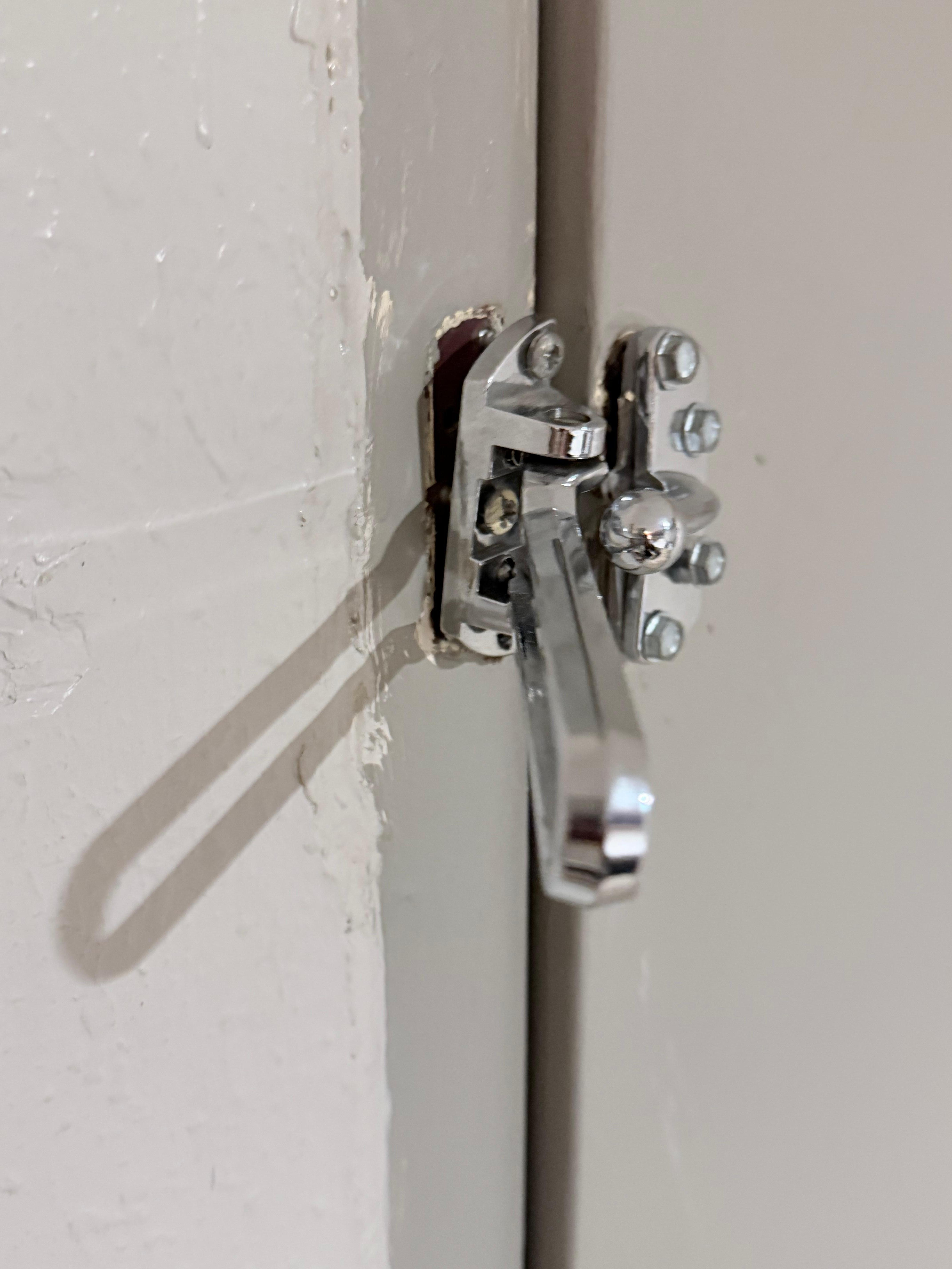Broken Latch and gap in closed door