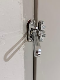 Broken Latch and gap in closed door