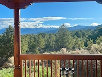 The view from back door. We watched it snow on the mountains. So nice!