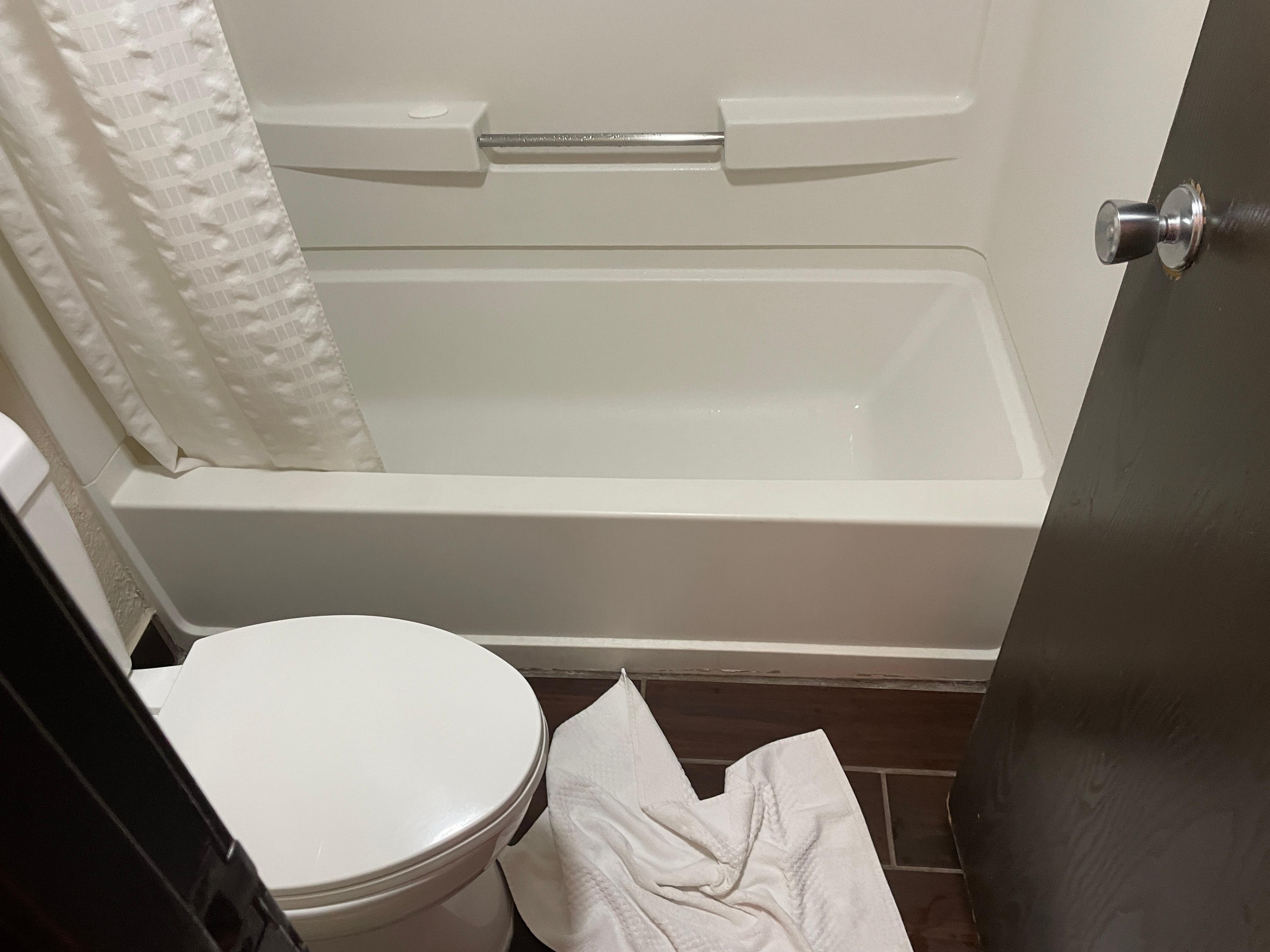 The size of the bathroom was tiny.