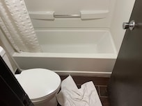 The size of the bathroom was tiny.