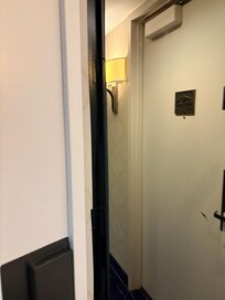 Mirrow held on wall with duct tape