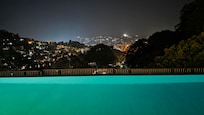 View across the pool at night