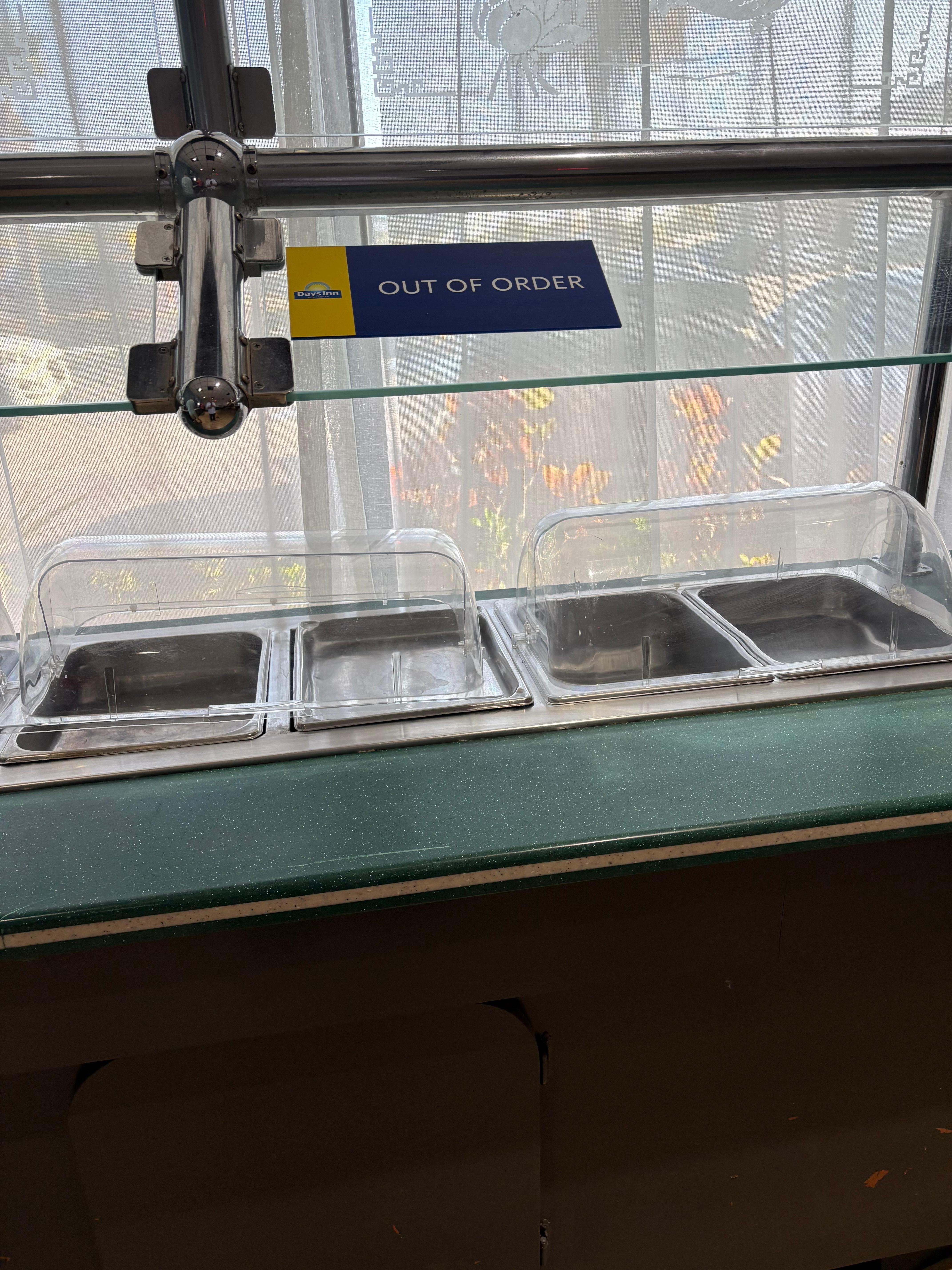 Sign says “out of order“. This is days in Stuart, Florida breakfast.