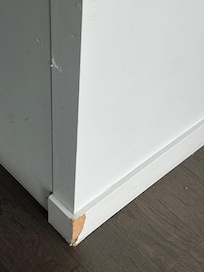 Wall holes and trim damage example