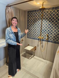 Mable shower with lovely tile work and rain head shower