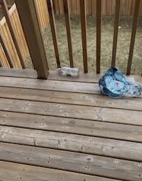 Little patio littered with garbage