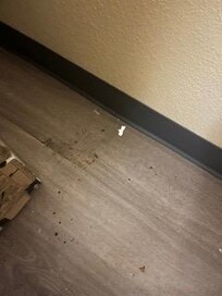 Dirt and grim by refrigerator