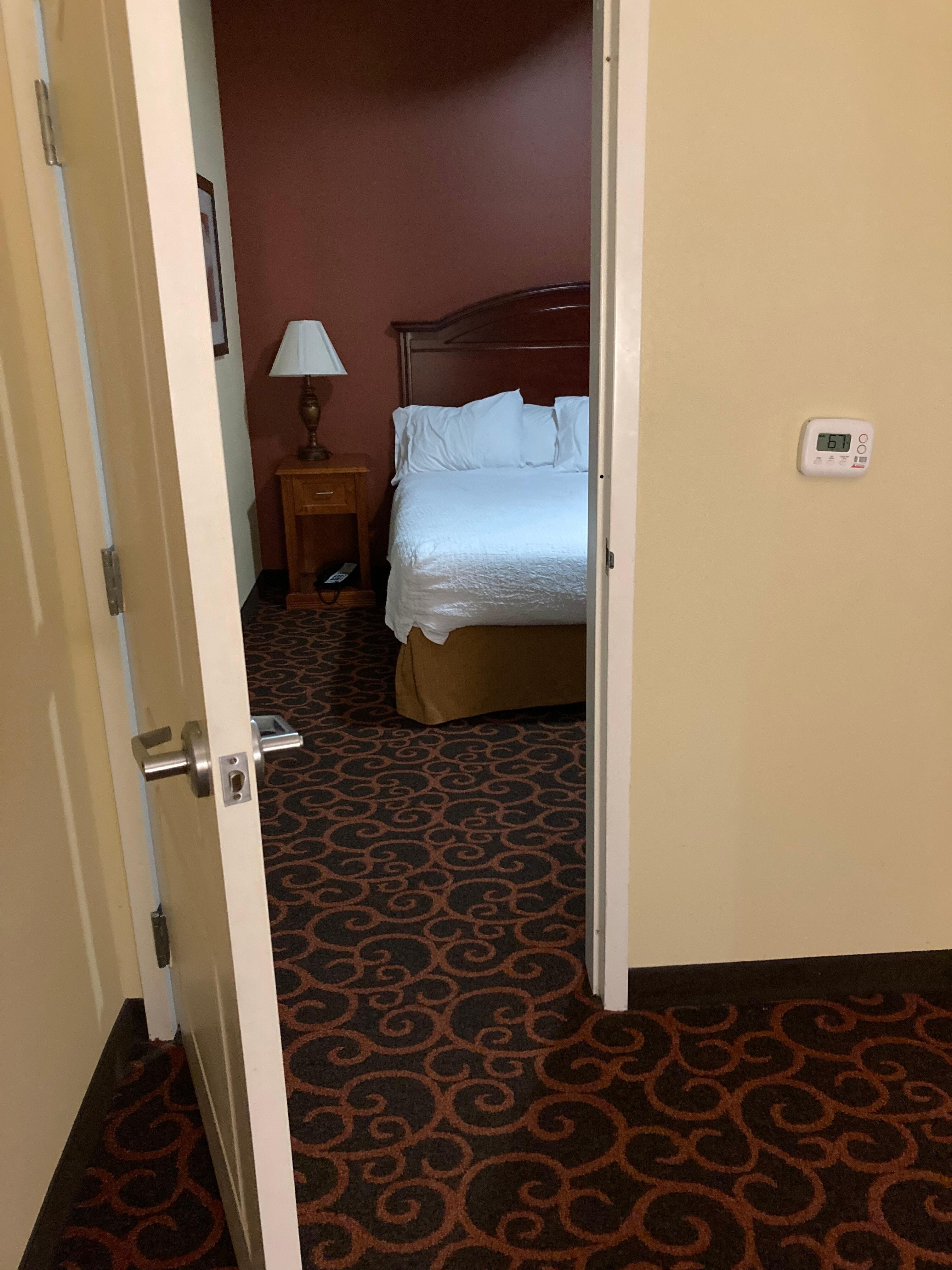 Separate bedroom with door. 