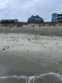 View from the ocean edge across the beach and dunes to the house.