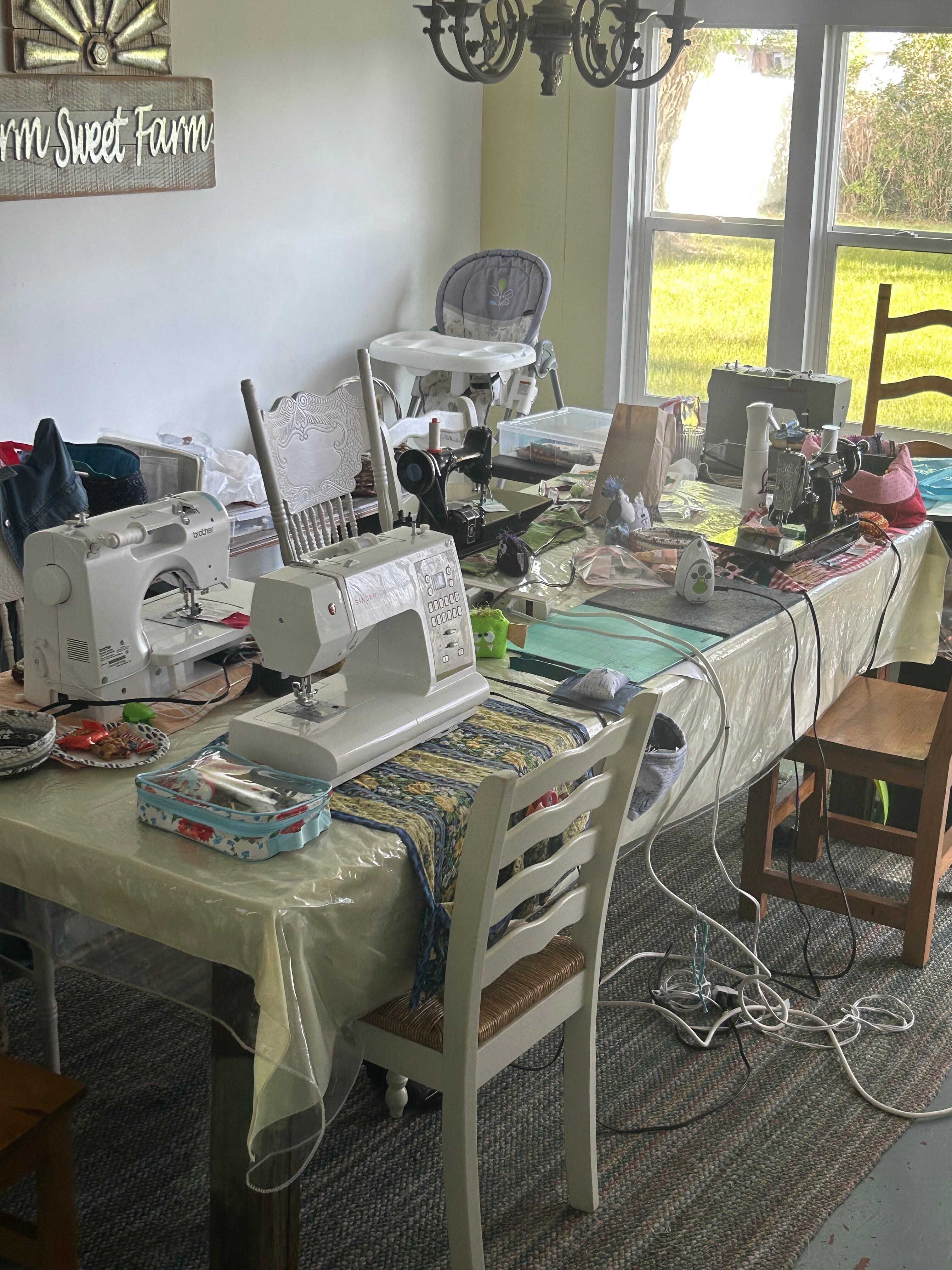 The table filled with sewing machines