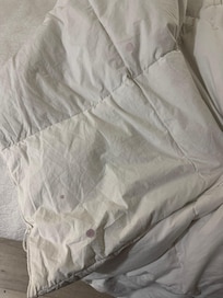Stains on comforter.