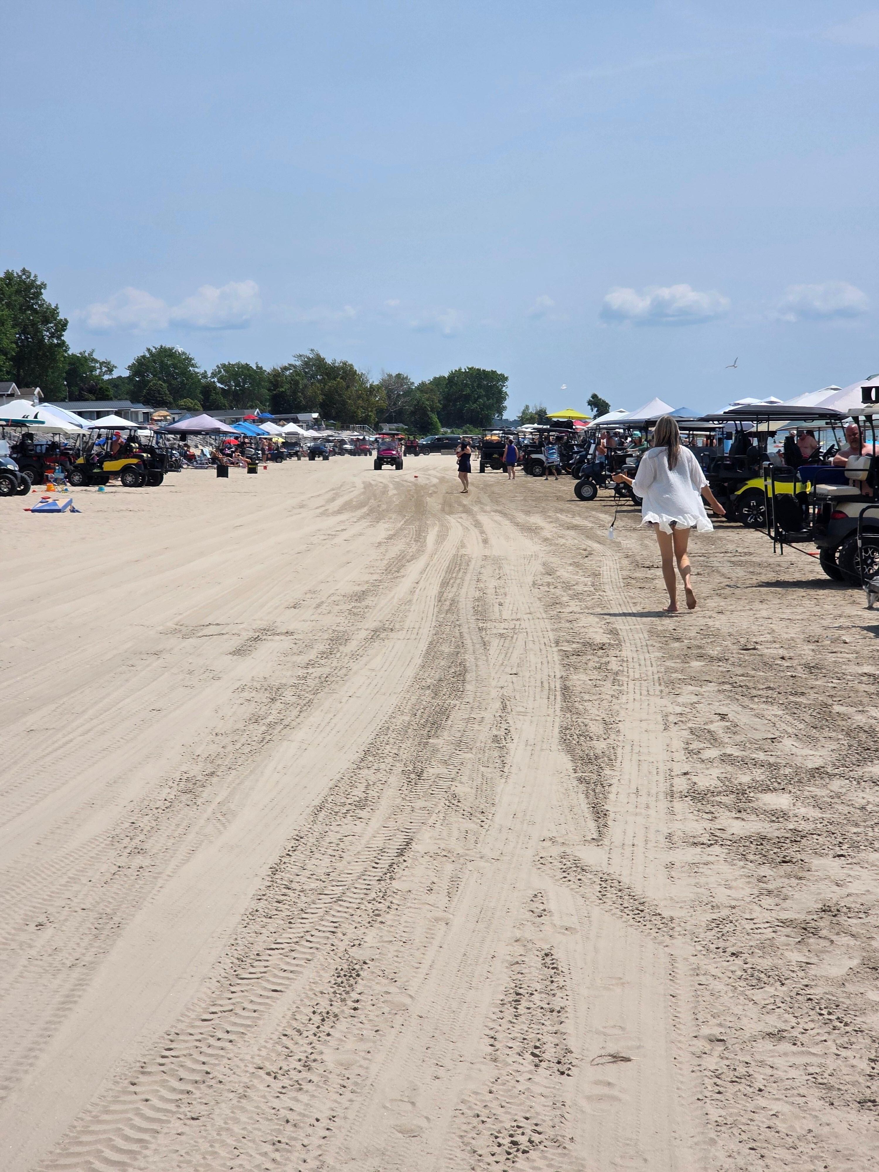 Friday by 9am. If we hadn't set up our tent and chairs at 7am, we wouldn't have had a spot on the beach in front of the house. 
