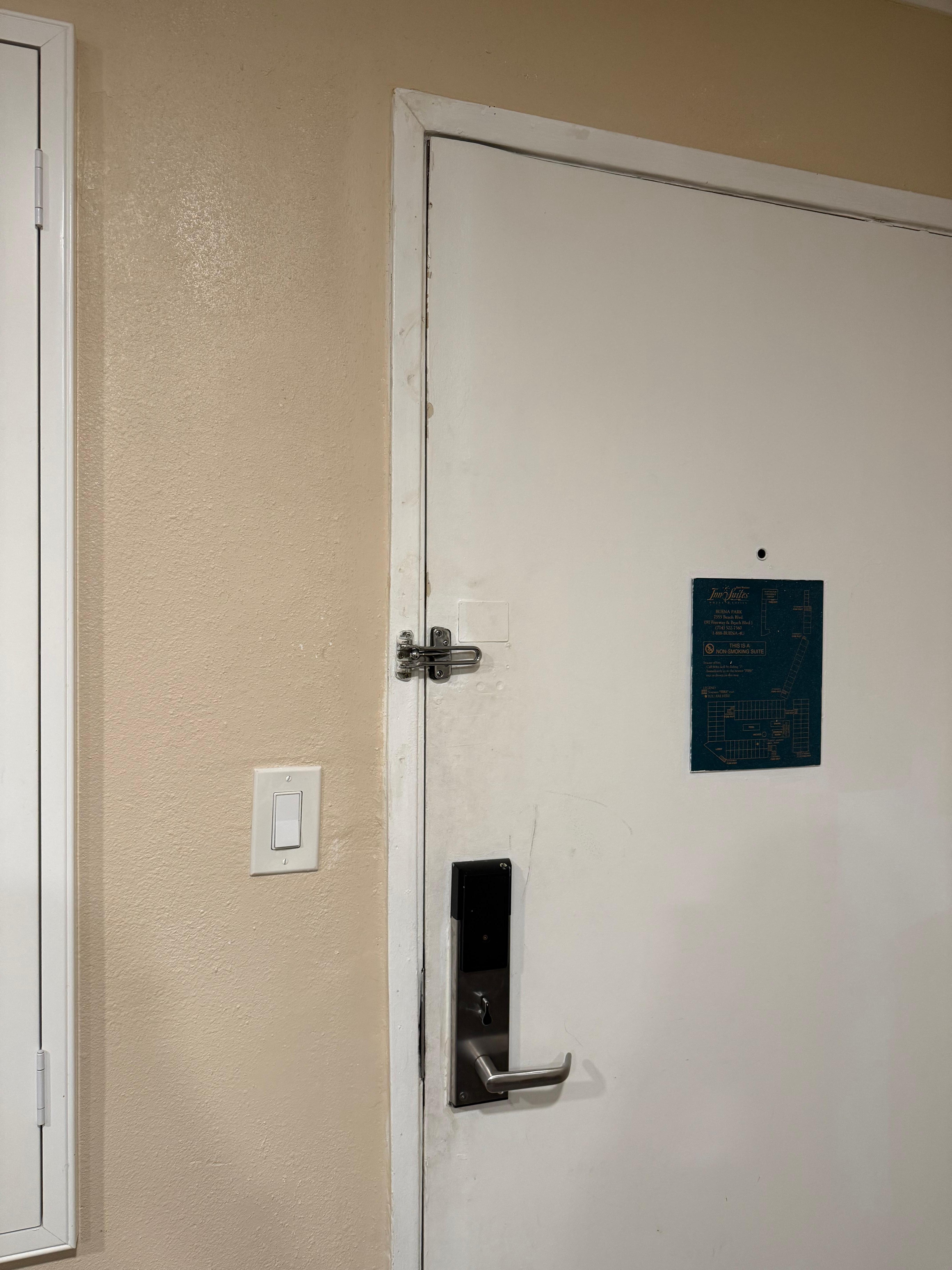 Crusty door that barely locked and light coming through the cracks. 