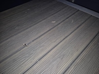 Cigarette marks on the patio table #1.