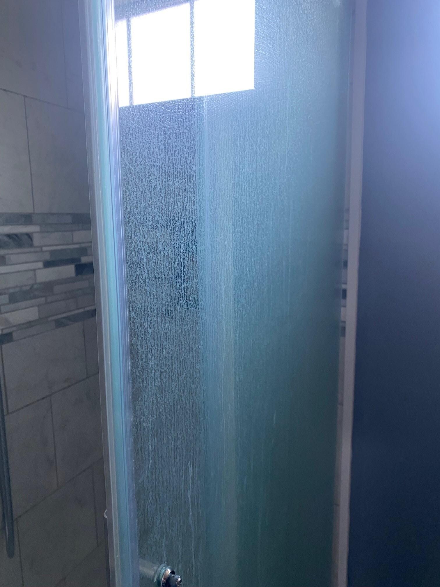 Bath shower door seemed to have never been cleaned