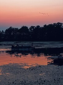 View from the lake house cabin we booked during sunset.