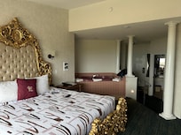 The bed and bath tub and restroom.