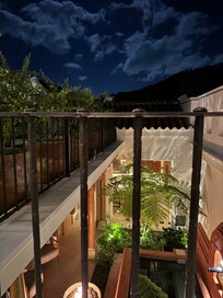 View from upstairs bedroom down at the pool