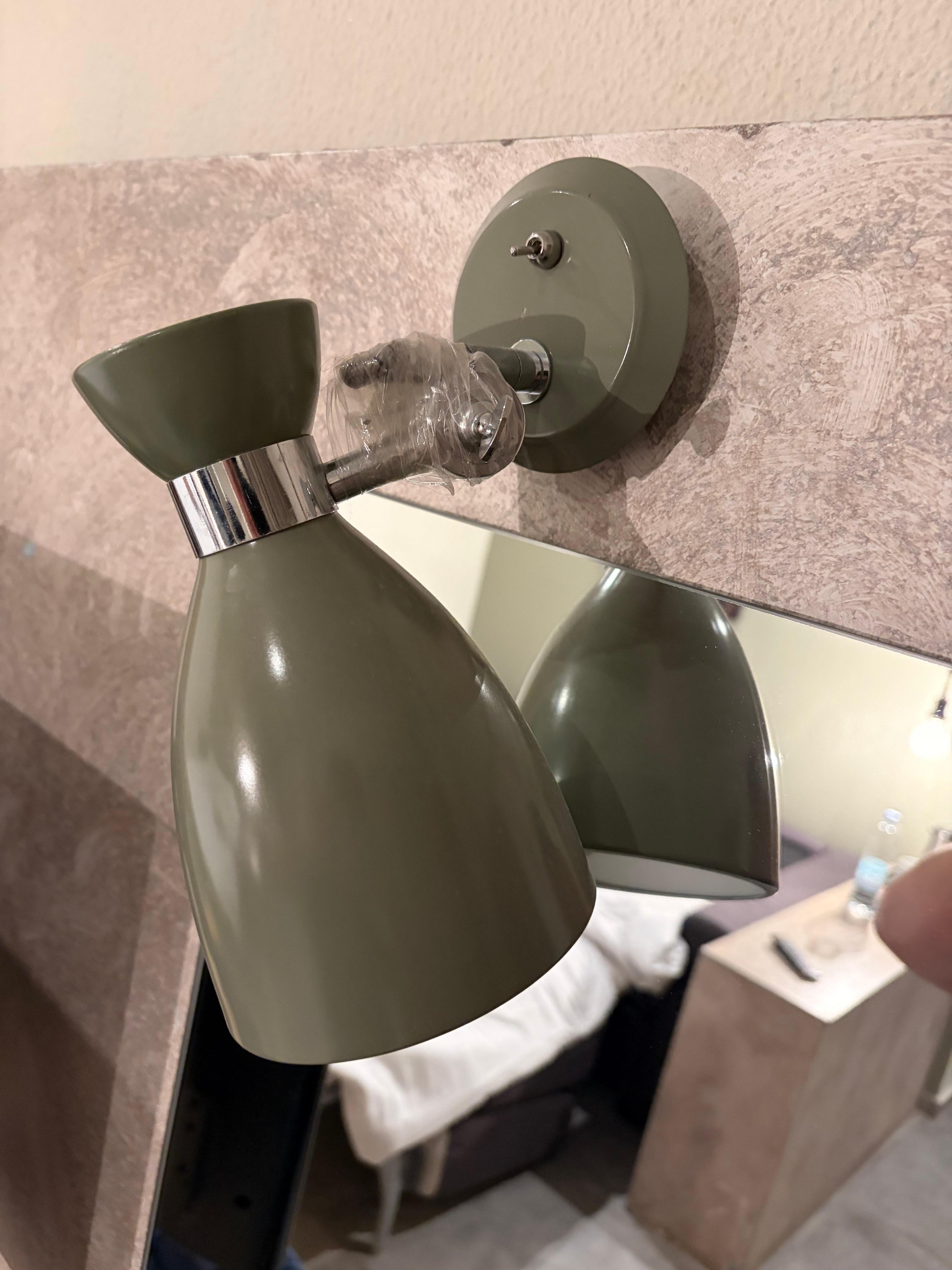 A lamp held together with tape. 