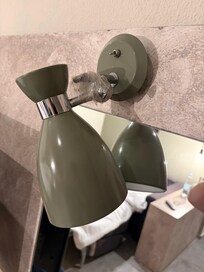 A lamp held together with tape.