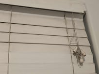 Tangled drawstrings; could not raise blinds.