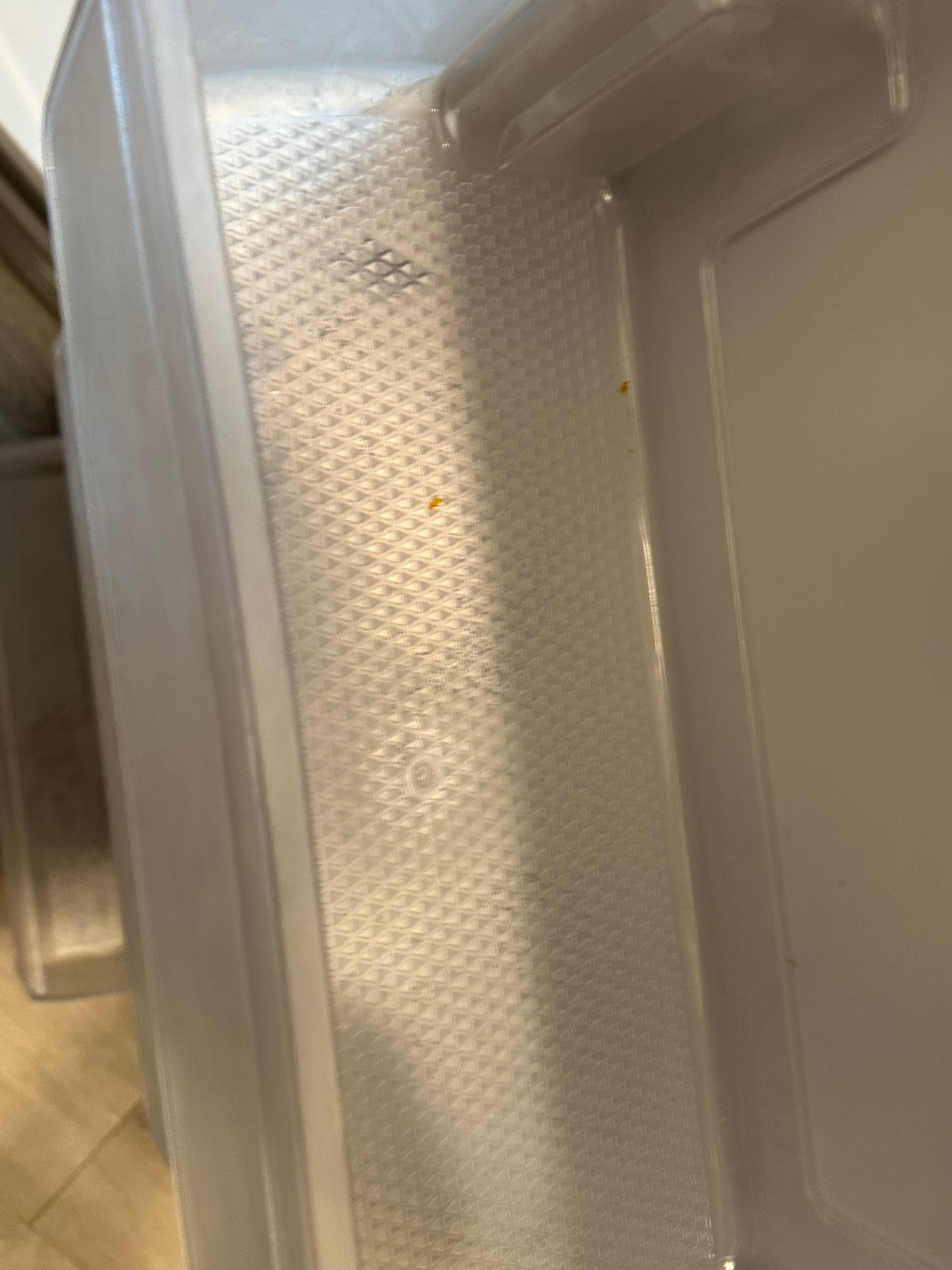 Refrigerator not clean. Food crumbs