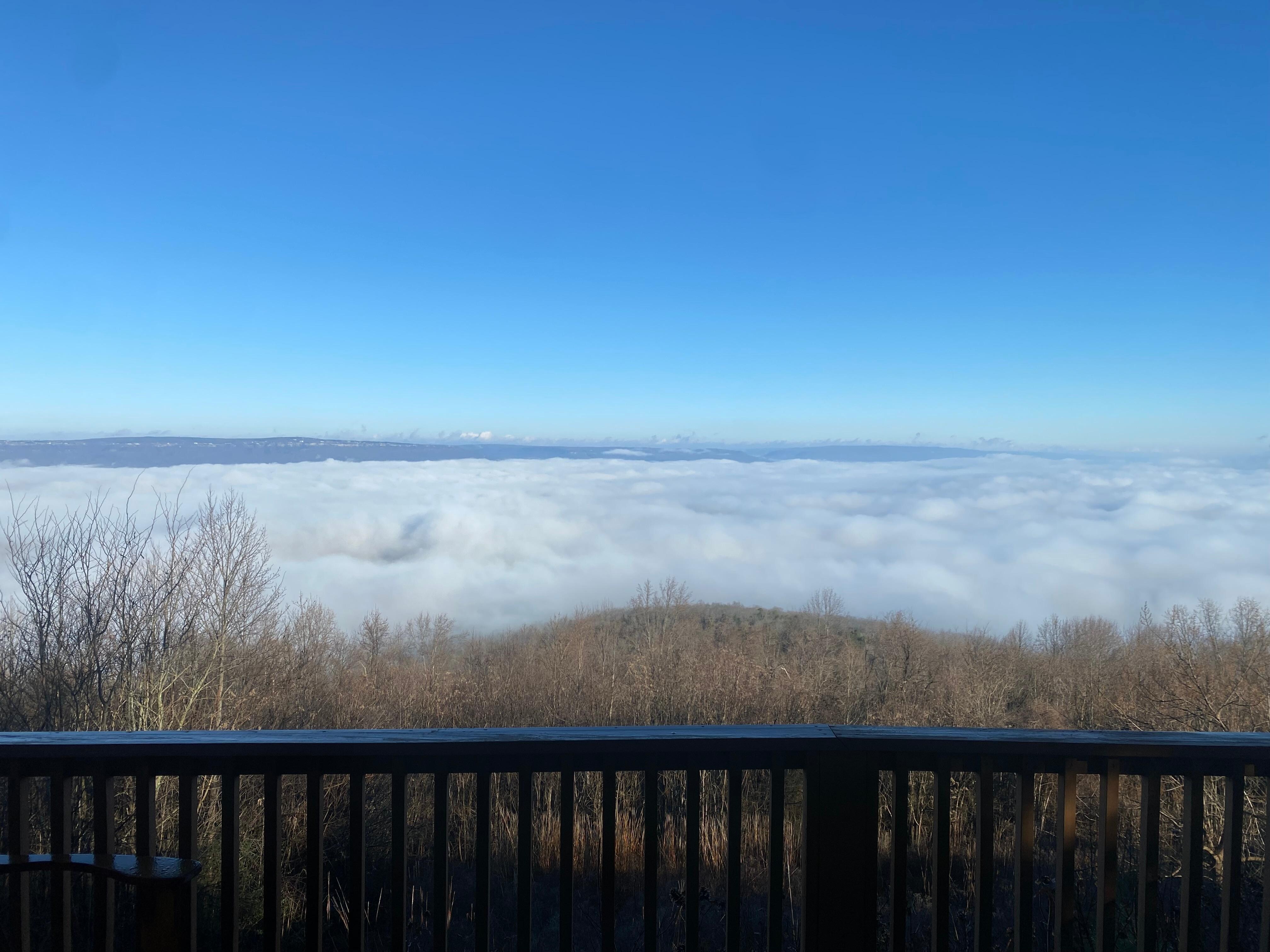 Morning view with clouds covering the lake and dam
