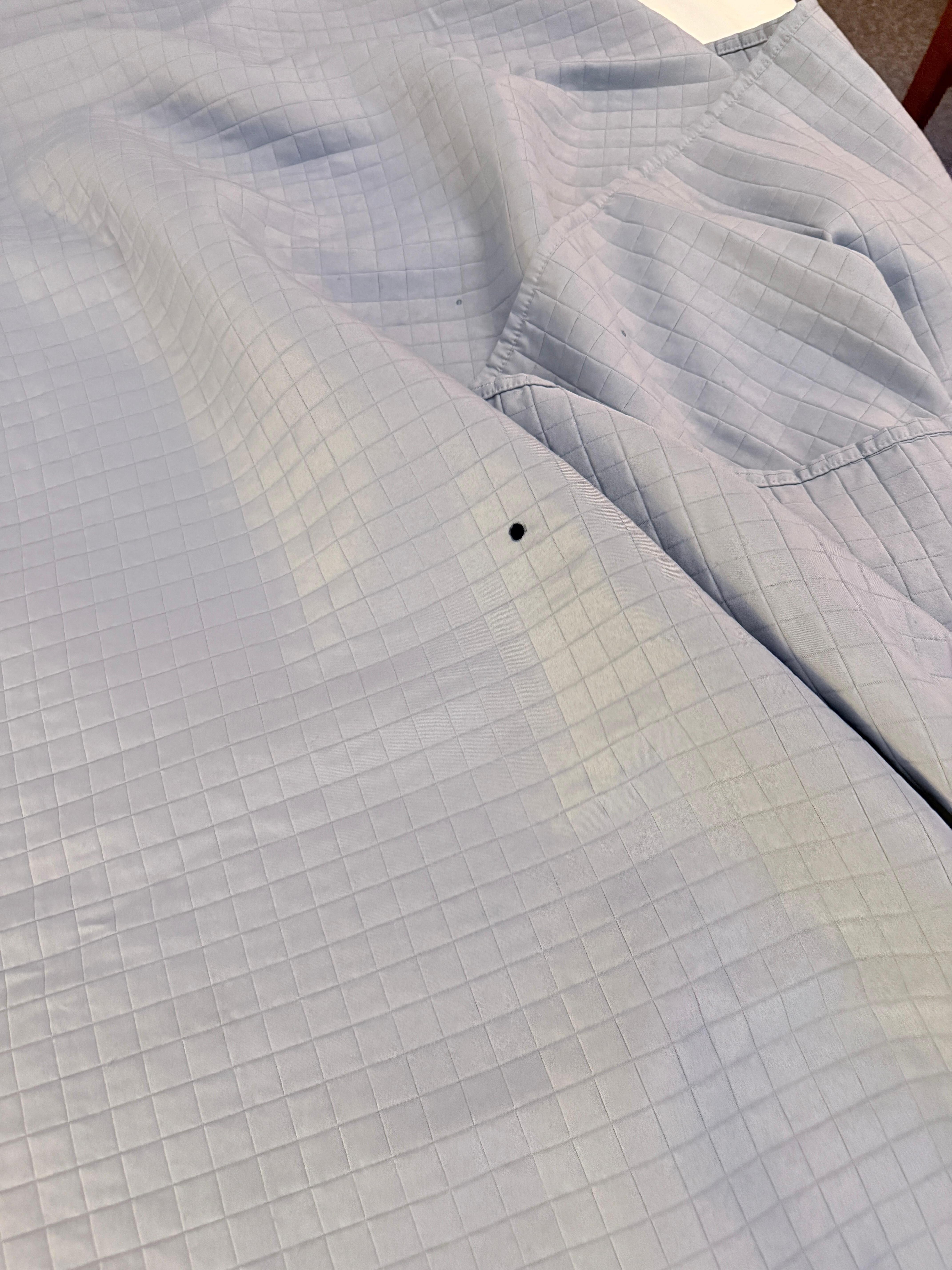 Hole may be by cigarette 