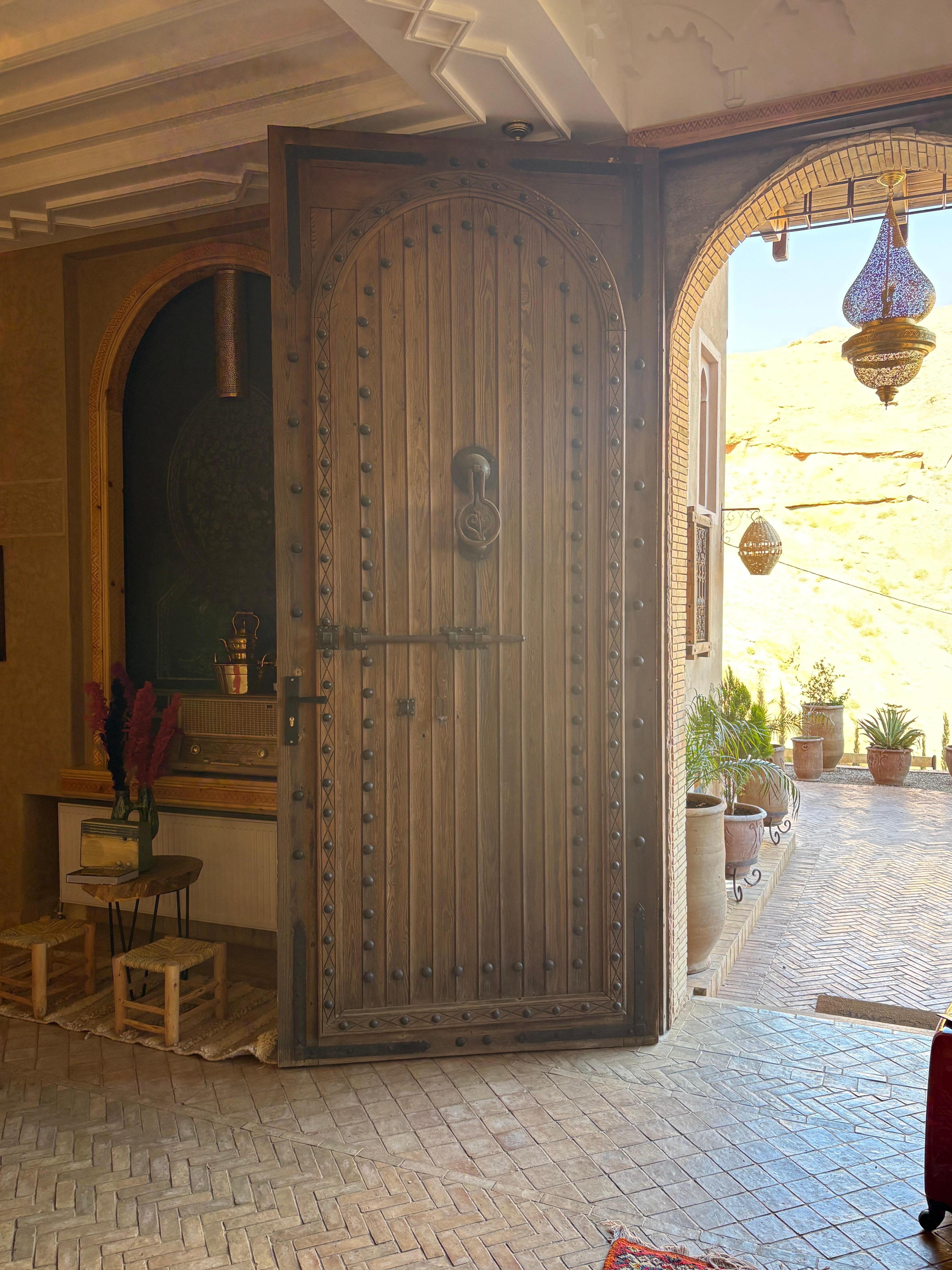 The front door is massive and gorgeous