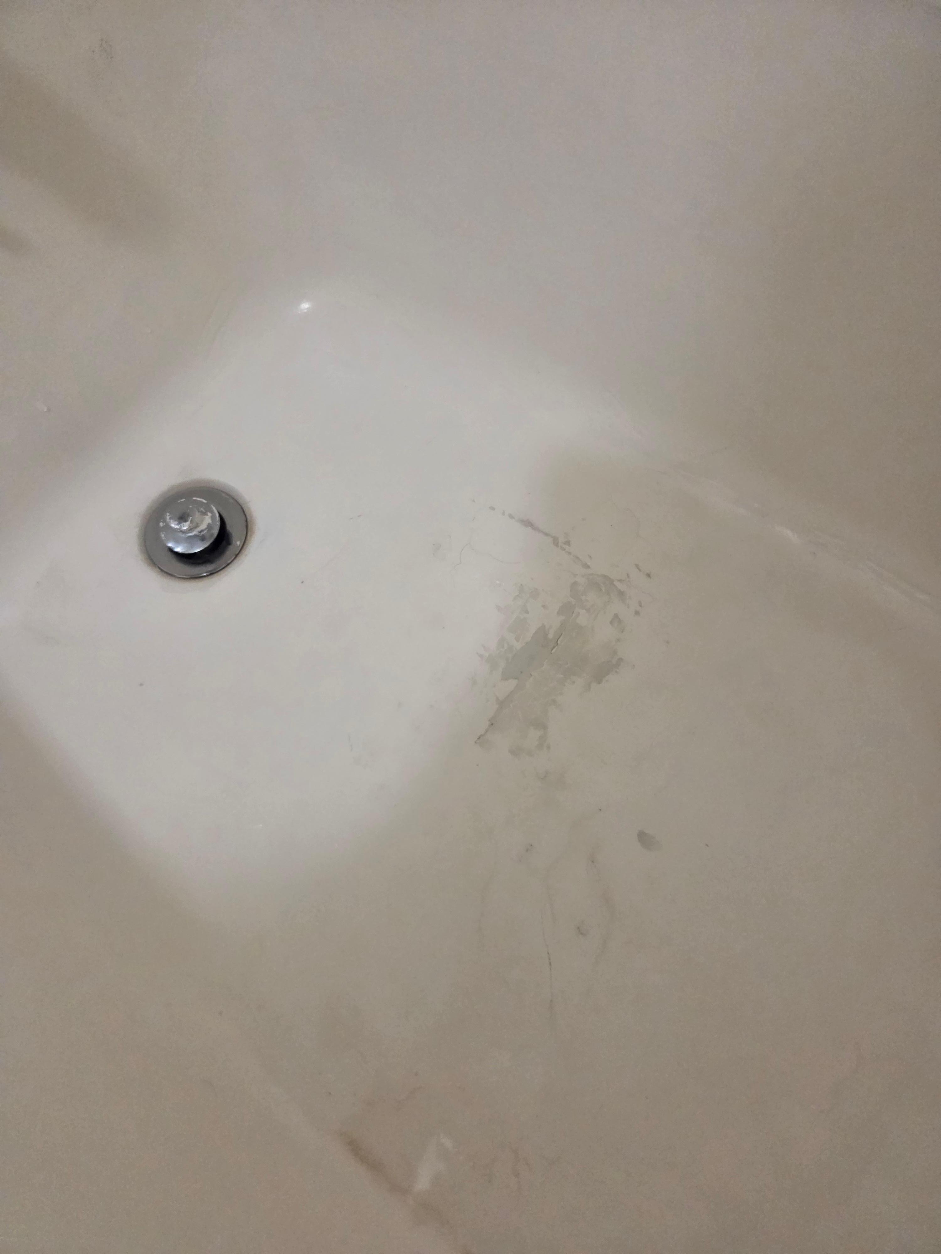They put caulking in the hole yhat was in one of the bathtubs