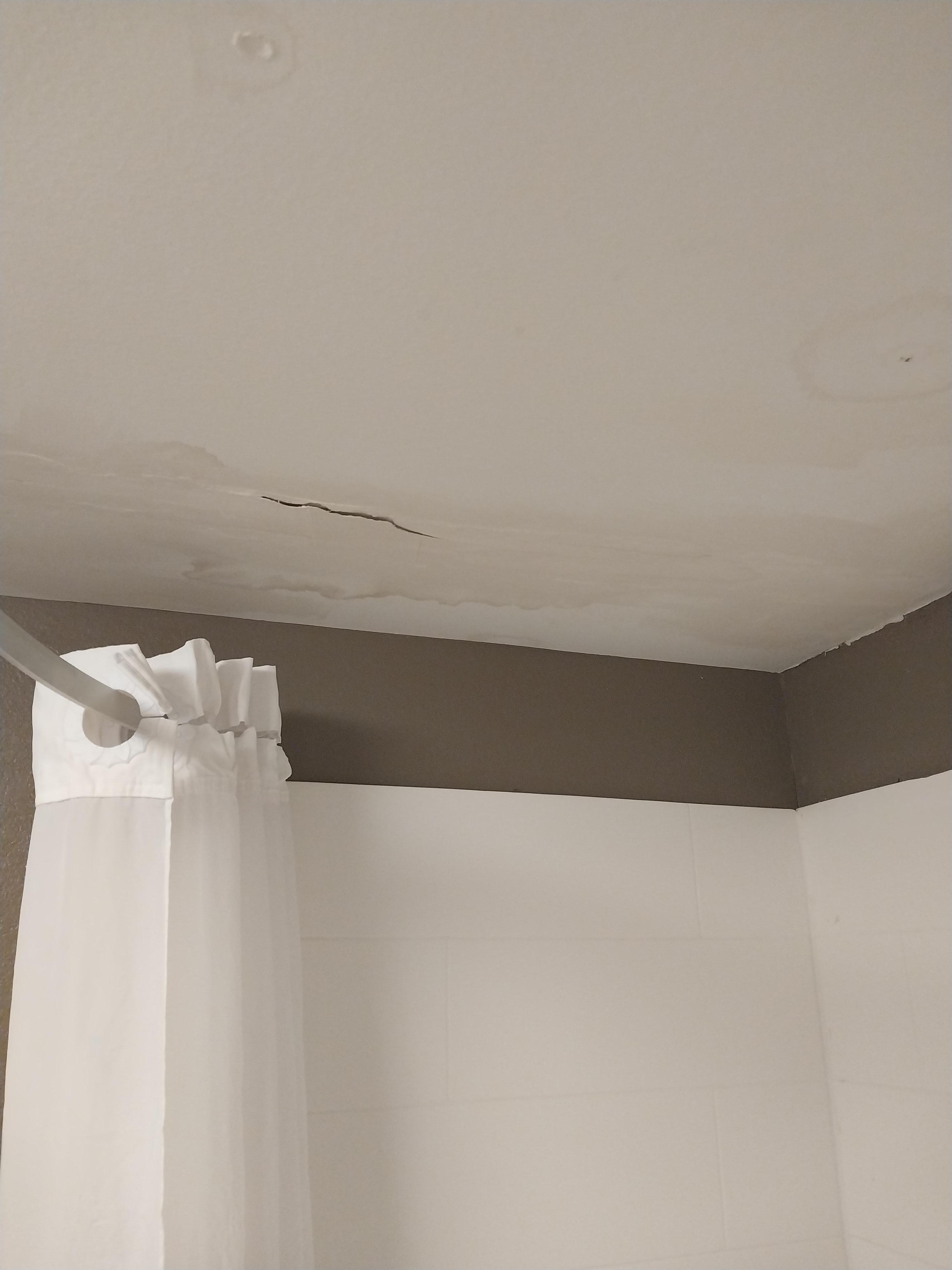 Ceiling in bathroom looked like there was leak upstairs and Ceiling never fixed
