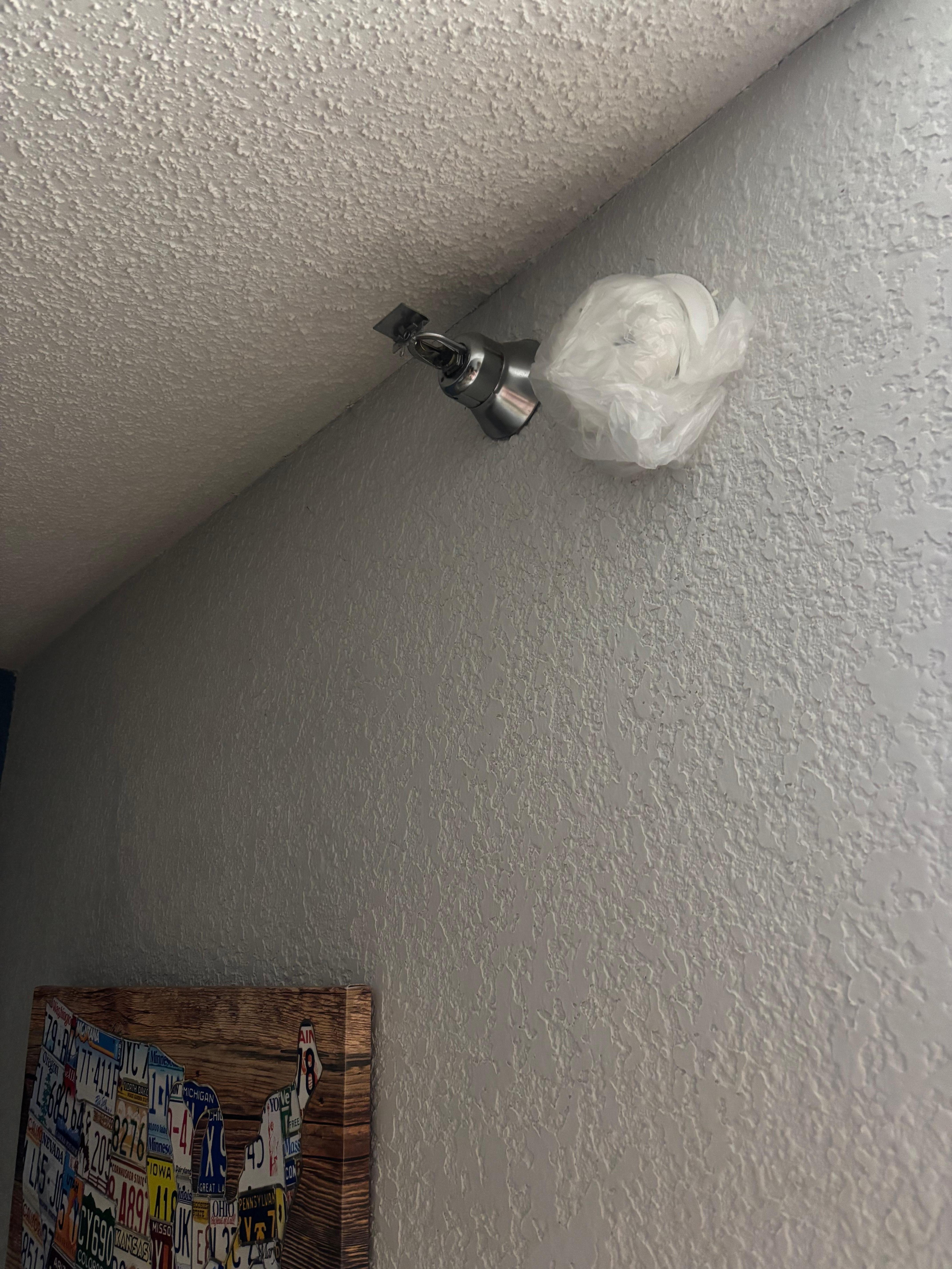 Smoke alarm had a bag covering it