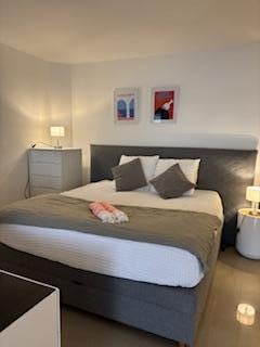 Bed area with view of the beach.