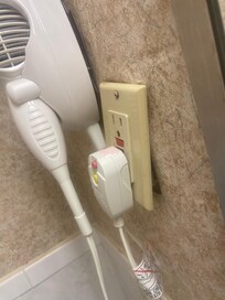 Electric socket left open , exposed