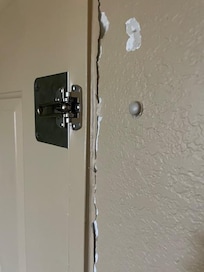 Rusty and peeling doorjamb