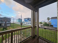 View from front balcony towards the right side looking at beach.