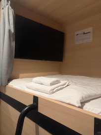 A big TV hung on the wall in the cabin.