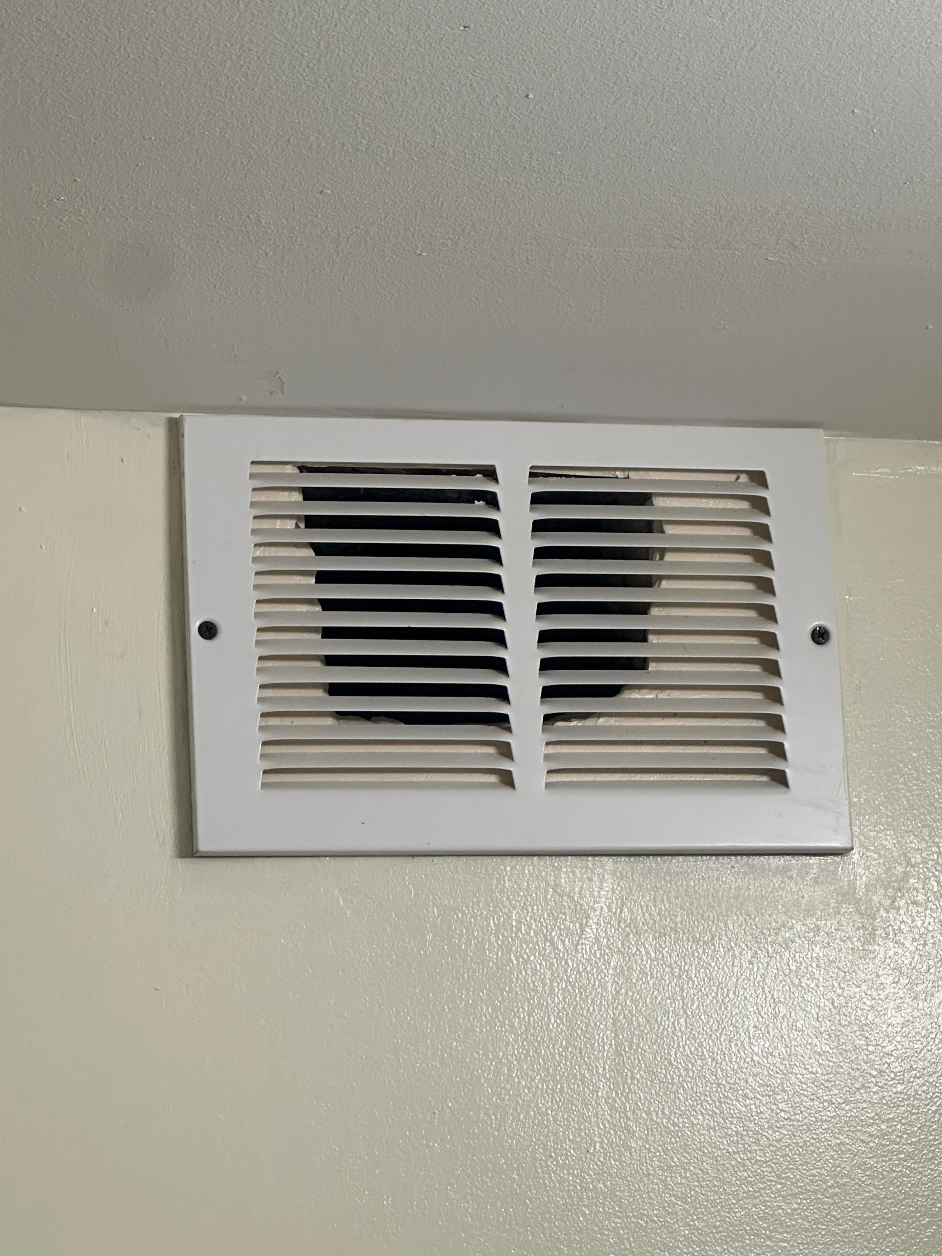 Just a hole in the wall with a vent cover 