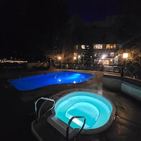 Outdoor pool and hot tub.