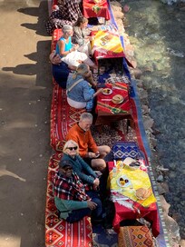 Lunch by the river on the day trip to the mountains
