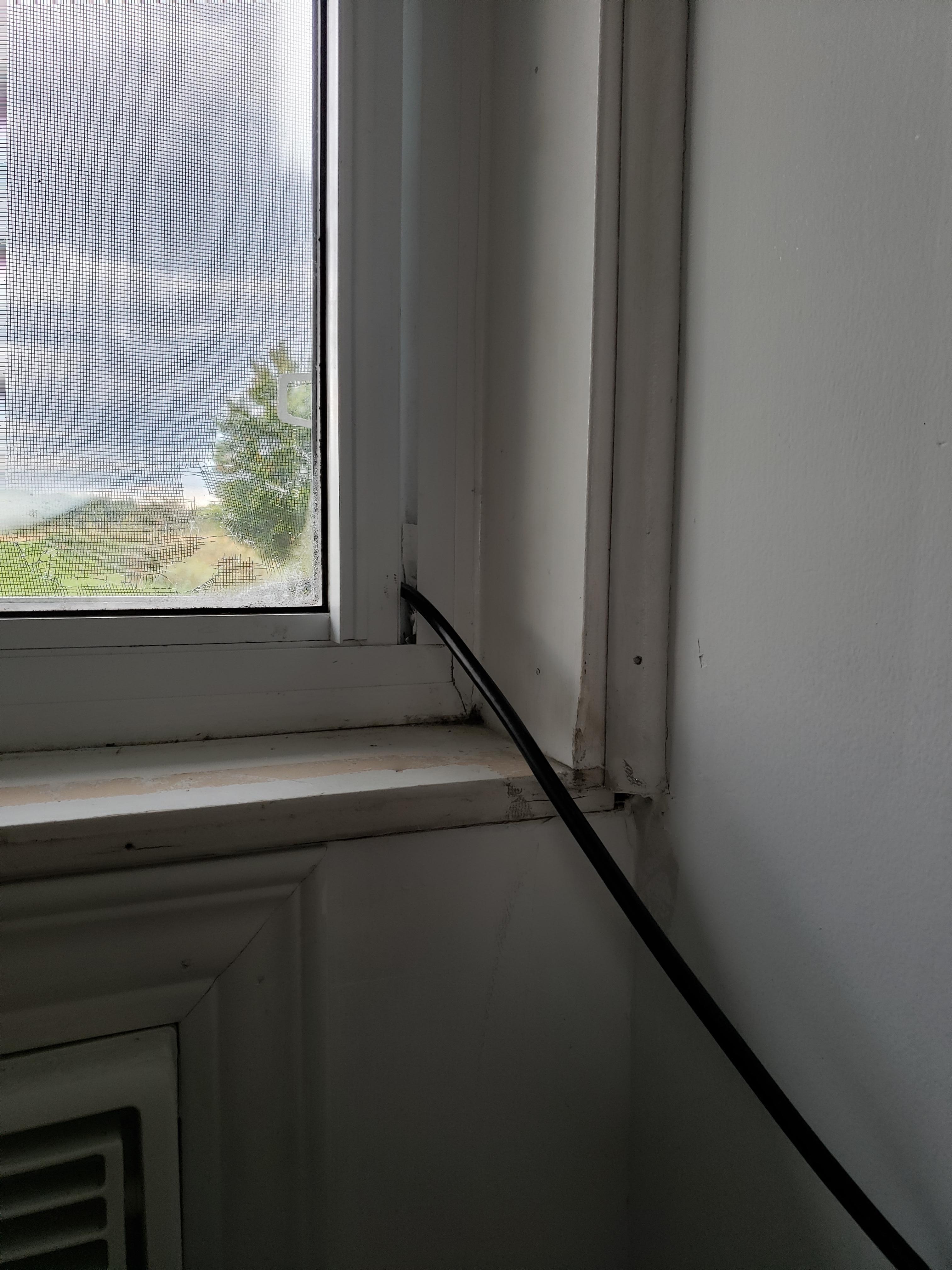 Cable cord thru open window