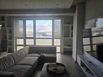 Super comfortable sectional with a beautiful view of the harbor.