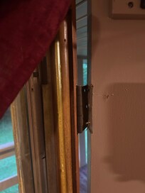 Busted door hinge