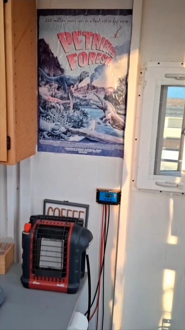 A little propane heater to keep you warm plus comfortable comforters to bundle up with 
Petrified National Forest is only 10 to 15 min away 